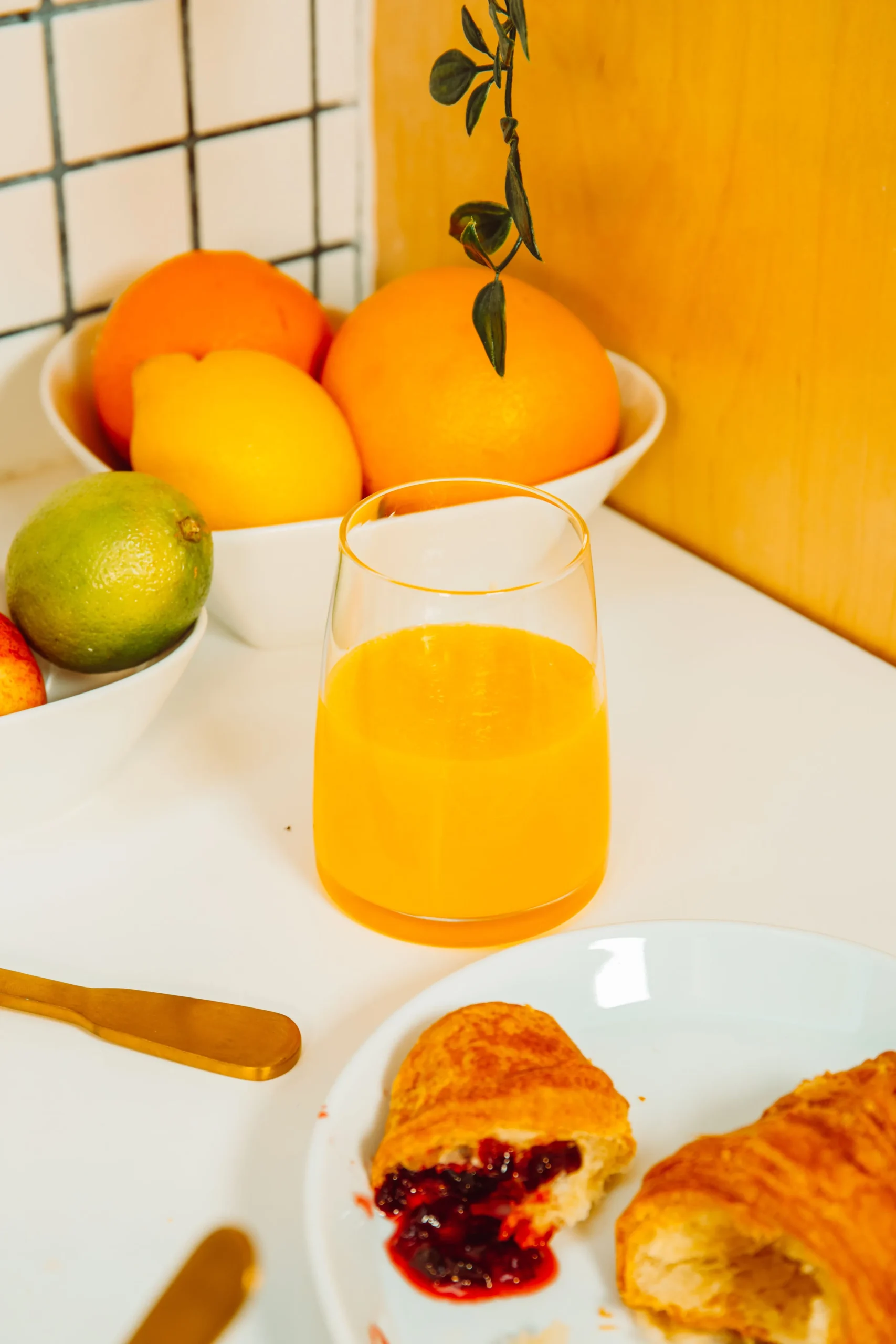Citrus, juice and a croissant