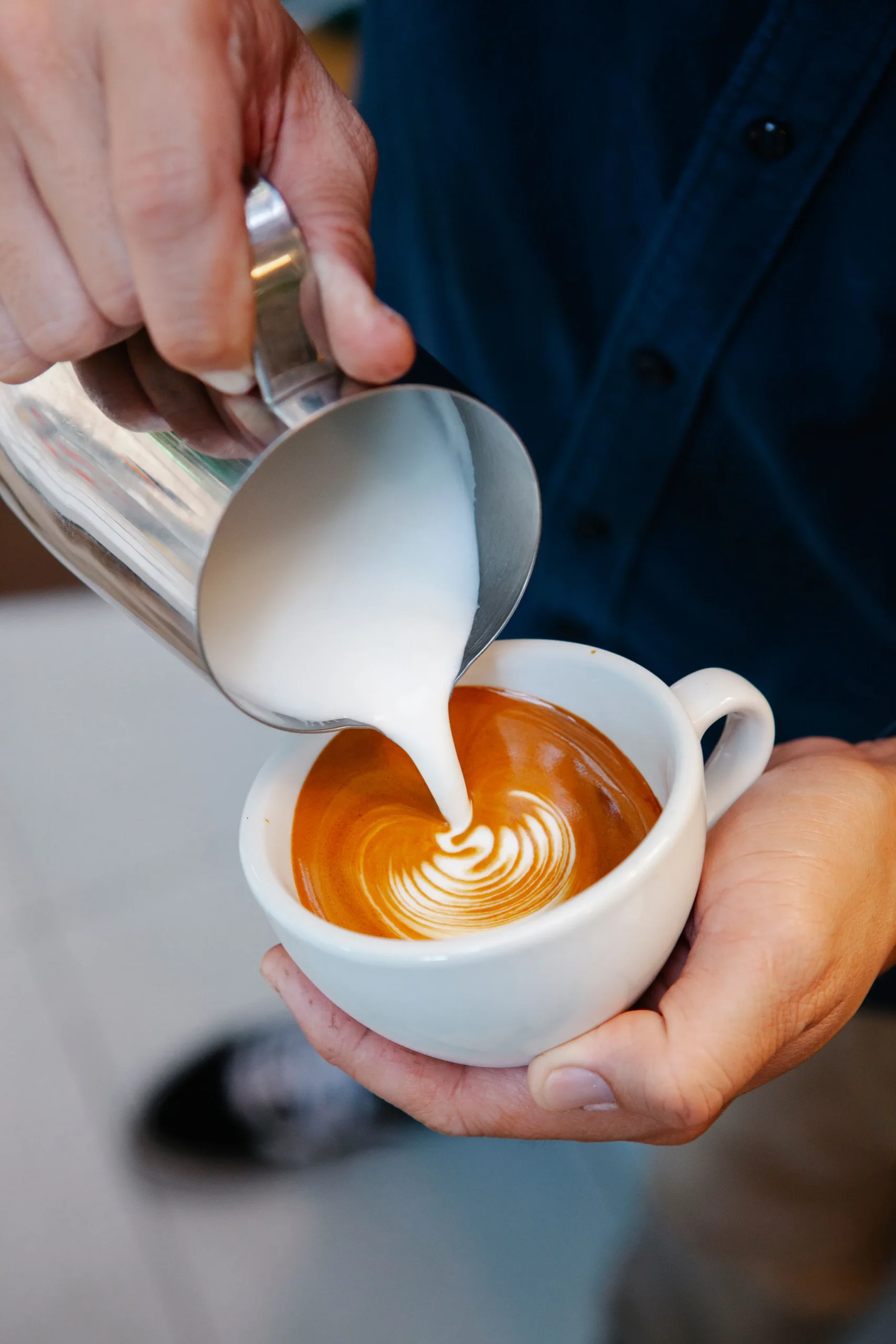 Milk poured into the morning coffee